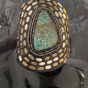 Leather cuff with turquoise center